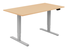 Load image into Gallery viewer, Height adjustable desk with beech top and silver frame. Electrically operated, ideal for working from home
