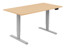 Load image into Gallery viewer, Height adjustable desk with beech top and silver frame. Electrically operated, ideal for working from home