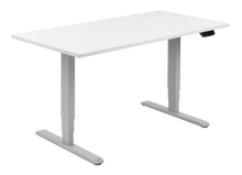 Load image into Gallery viewer, Height adjustable desk with white top and silver frame. Electrically operated, ideal for working from home
