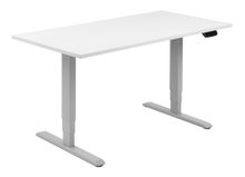 Load image into Gallery viewer, Height adjustable desk with white top and silver frame. Electrically operated, ideal for working from home